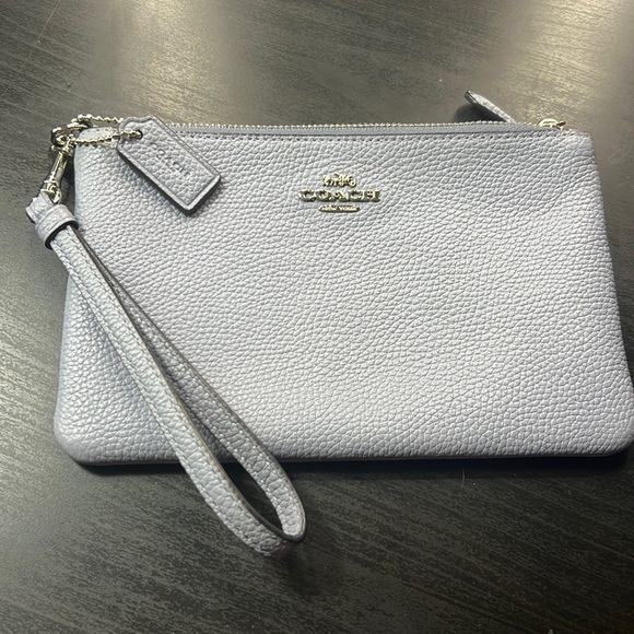 Coach Handbags - Baby blue hand held coach wrist wallet